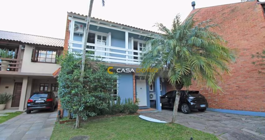 Casa em condomínio fechado com 4 quartos à venda na Rua Conrado Ferrari, 71, Jardim Isabel, Porto Alegre