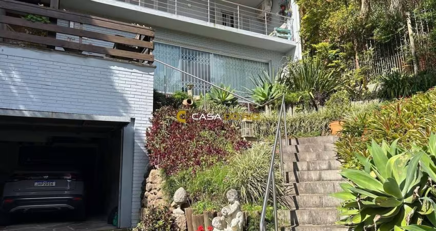 Casa com 3 quartos à venda na Rua Edgar Luiz Schneider, 480, Jardim Isabel, Porto Alegre