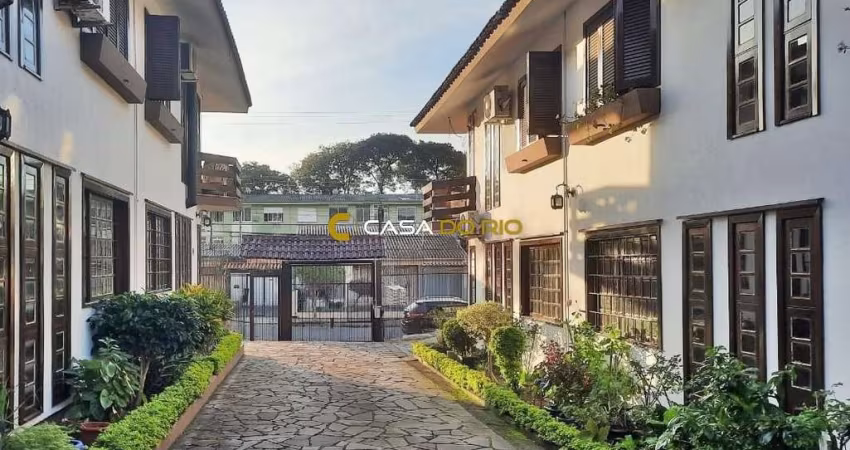 Casa em condomínio fechado com 3 quartos para alugar na Rua Doutor Mário Totta, 1925, Camaquã, Porto Alegre