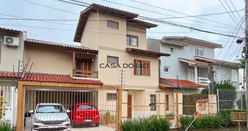 Casa com 3 quartos à venda na Rua Luiz Delfino, 109, Espírito Santo, Porto Alegre