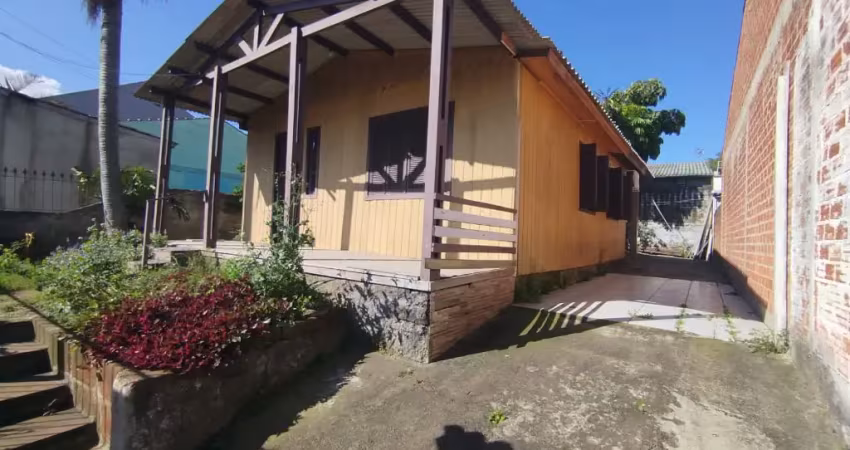 Casa 3 dormitórios com pátio amplo à venda em cachoeirinha, próximo ao parcão