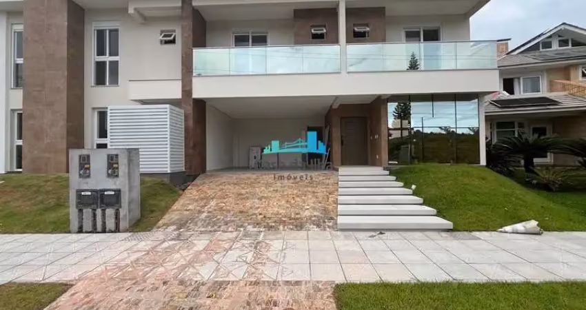 Casa em condomínio fechado com 3 quartos à venda no Cacupé, Florianópolis 