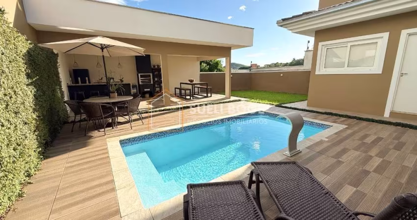 CASA EM CONDOMÍNIO COM 4 DORMITÓRIOS, PISCINA E ÁREA DE FESTAS