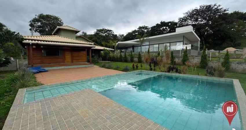Casa com 3 dormitórios à venda, 200 m² por R$ 1.200.000,00 - Condomínio Serra dos Bandeirantes - Mário Campos/MG