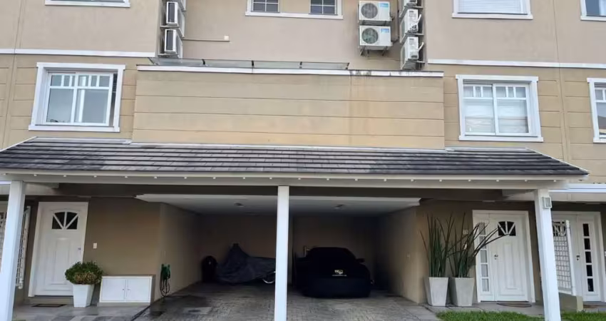 Casa em condomínio fechado com 4 quartos à venda na Rua Attílio Bilibio, 120, Jardim Carvalho, Porto Alegre