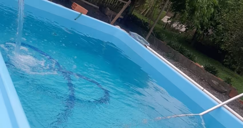 SÍTIO COM PISCINA NA ÁREA RURAL DO BRAÇO EM CAMBORIÚ – ACEITA PERMUTA EM CAMBORIÚ