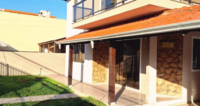lindo sobrado com 2 lotes no centro de Camboriú