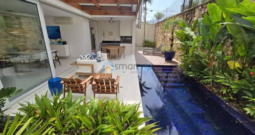 Casa de Luxo em Condomínio Pé na Areia em Juquehy: 5 Suítes, Piscina Privativa, Ar-Condicionado e Lazer Completo com Sauna e Jacuzzi.