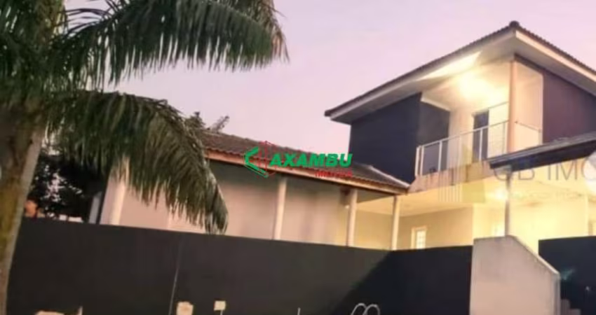 SOBRADO COM 5 DORMITÓRIOS (1 SUITE MASTER), SALA INTEGRADA COM ESPAÇO GOURMET E PISCINA