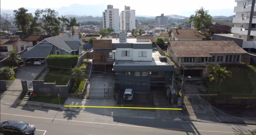 Terreno com casa e galpão Comercial Costa e Silva Joinville.