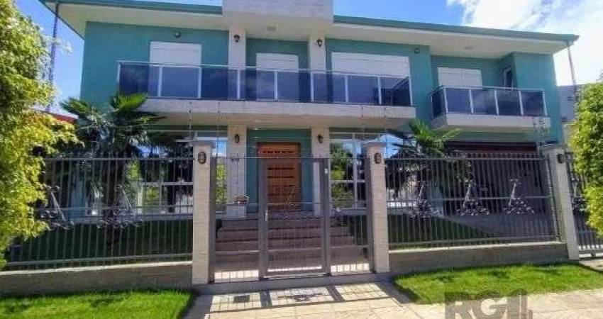 Casa em Porto Alegre, no bairro Hípica, com 3 dormitório(s), e 3 banheiros, à ve