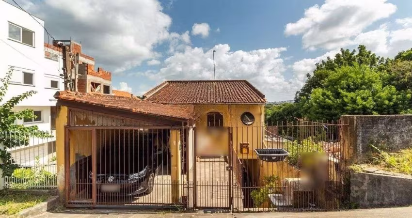 Casa de 4 dormitórios no bairro Camaquã
