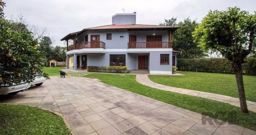 Sobrado com 6 suites, lareira, lavabo, pátio - Bairro Belém Velho