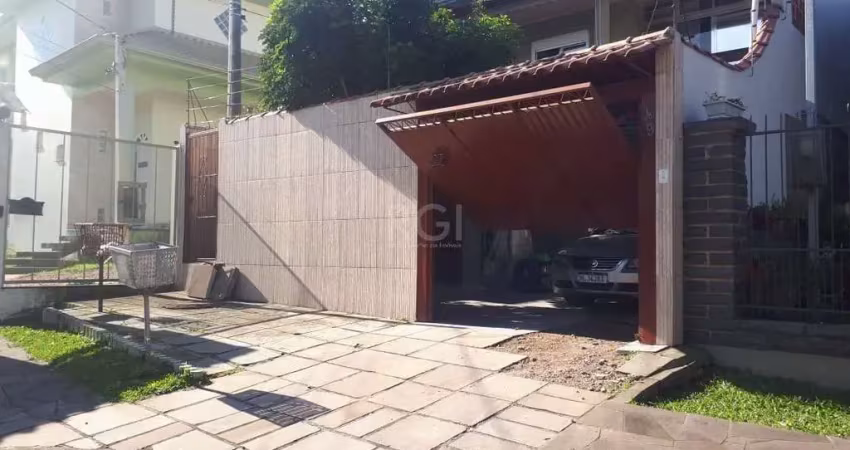 Casa com 3 quartos à venda na Rua José Pereira da Cunha, 49, Vila Nova, Porto Alegre