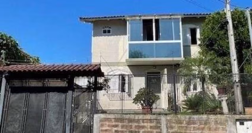 Casa em Porto Alegre, no bairro Vila Nova, com 3 dormitório(s), e 3 banheiros, à