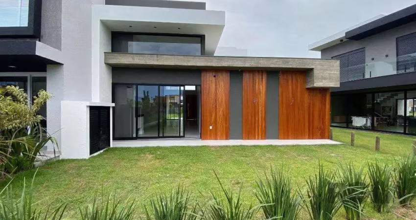 Casa em condomínio 4 dormitórios à venda centro xangri-lá/rs
