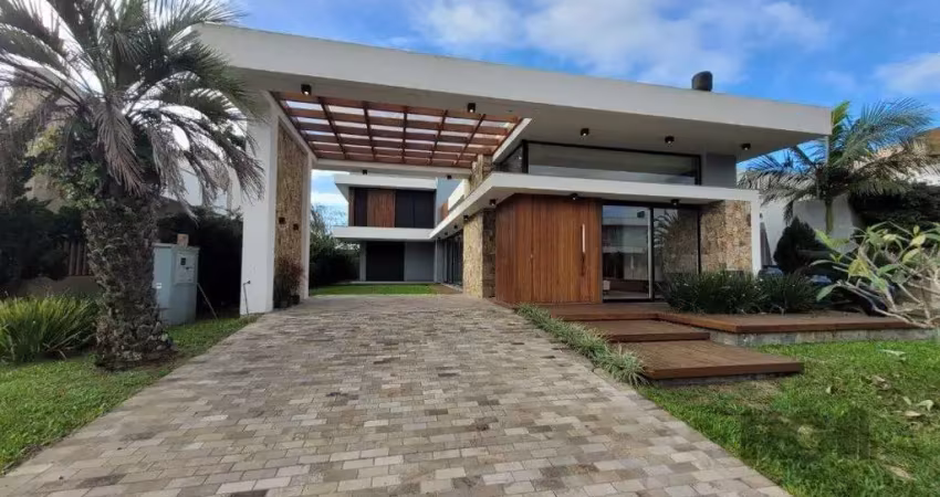 Casa em condomínio 4 dormitórios à venda atlântida xangri-lá/rs