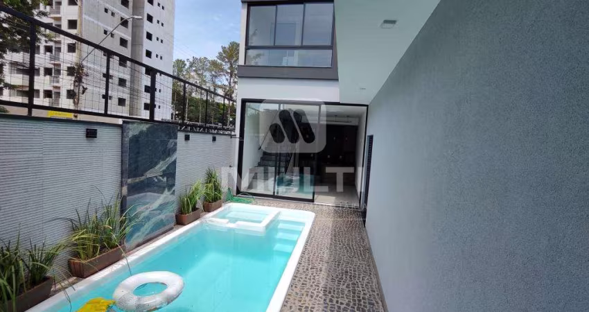 Casa em condomínio fechado com 4 quartos à venda no Jardim Holanda, Uberlândia 
