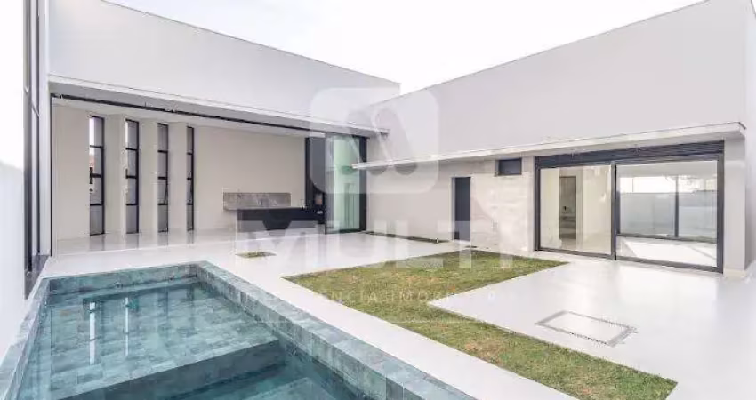 Casa em condomínio fechado com 3 quartos à venda no Buritis, Uberlândia 