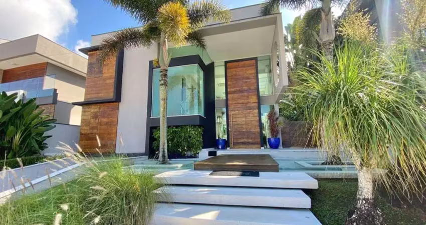 Casa para venda em riviera de 525.00m² com 5 quartos, 5 suites e 6 garagens