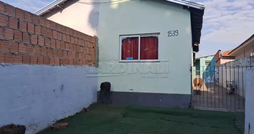 Casa para venda em centro de 125.00m² com 2 quartos e 2 garagens