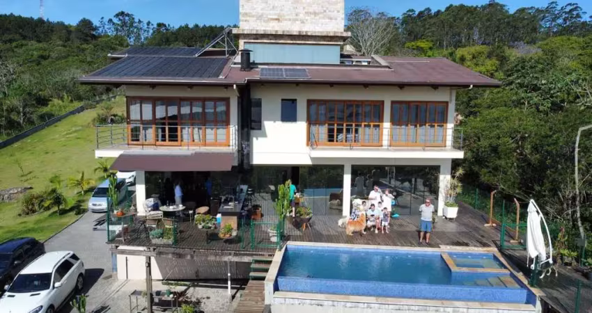Casa alto padrão à venda com possibilidade de locação. residência com 3 quartos sendo 3 suítes, 12 vagas, piscina, terreno com 6.000m², joão paulo, florianópolis - sc