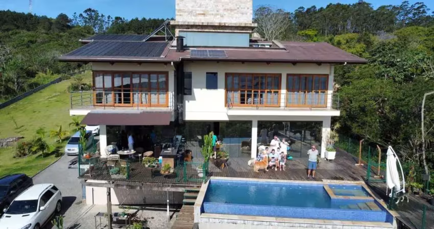 Casa alto padrão à venda com possibilidade de locação. residência com 3 quartos sendo 3 suítes, 12 vagas, piscina, terreno com 6.000m², joão paulo, florianópolis - sc