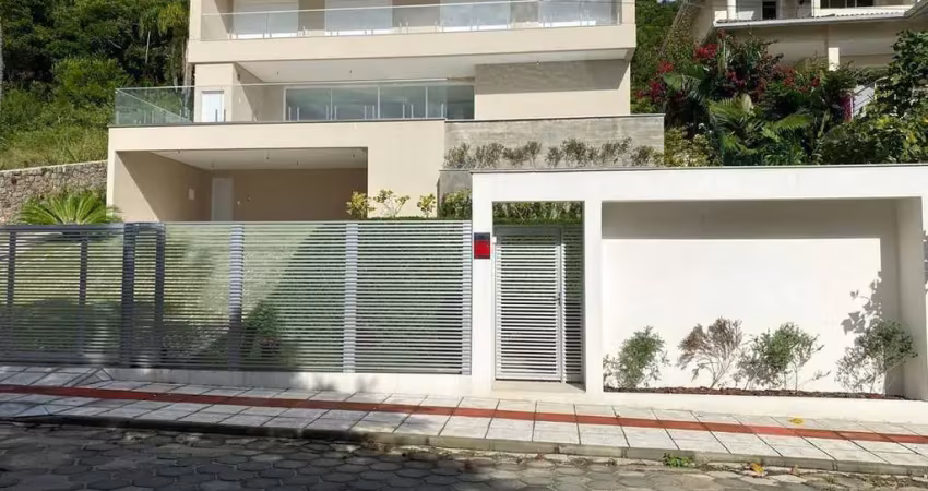 Casa à venda, 6 quartos sendo 5 suítes, 2 vagas, piscina, 600m² privativos, praia brava, florianópolis - sc