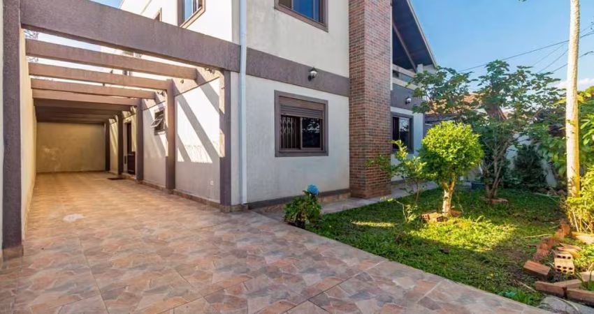 Casa com 5 dormitórios à venda, 220 m² por R$ 850.000,00 - Uberaba - Curitiba/PR
