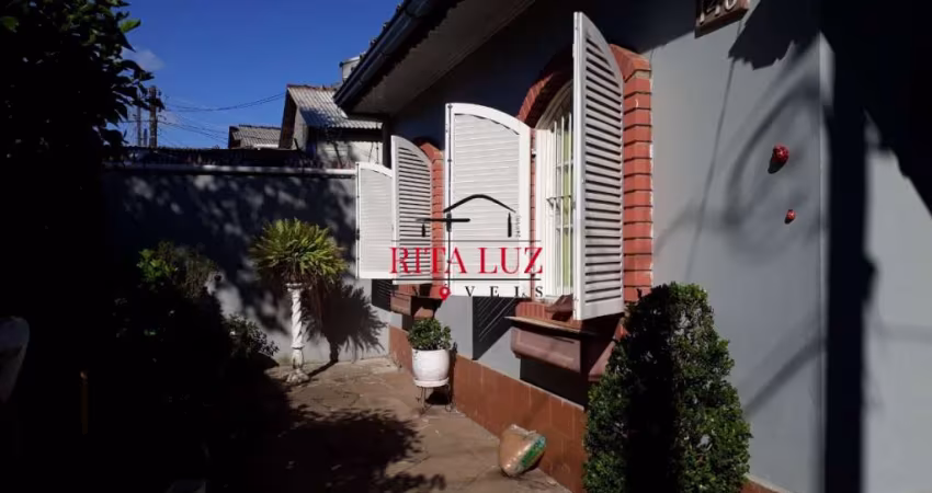 Casa com 3 quartos à venda na Rua Bernardo Guimarães, 148, Partenon, Porto Alegre