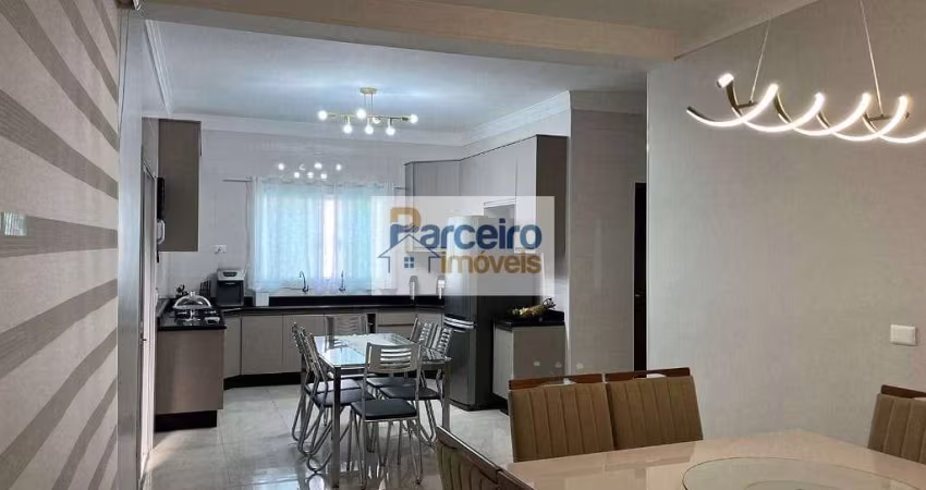 Linda casa terrea com 3 dormitórios à venda, 228 m² com piscina.