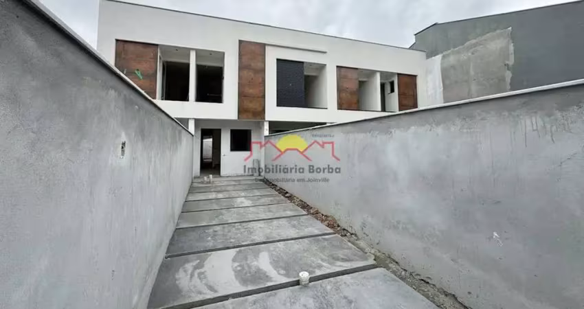 Sobrado Geminado com 02 Vagas de Garagem