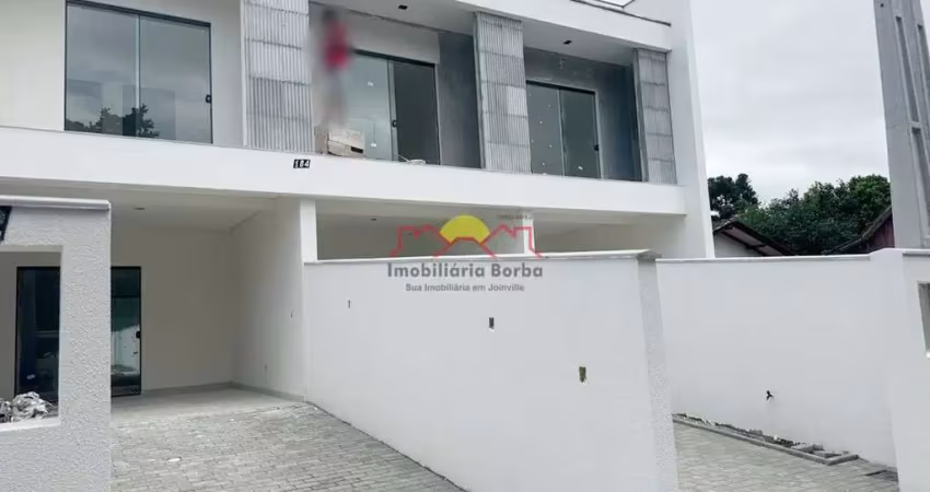 Sobrado Geminado com Suíte no Iririú