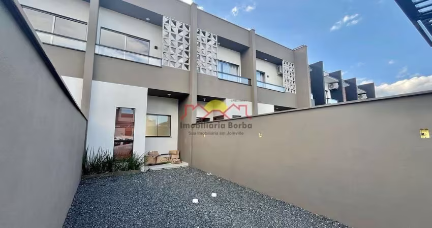Sobrado Geminado com 02 Vagas de Garagem no Iririú