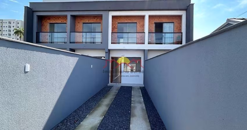 Sobrado Geminado com Amplo Terreno e 02 Suítes