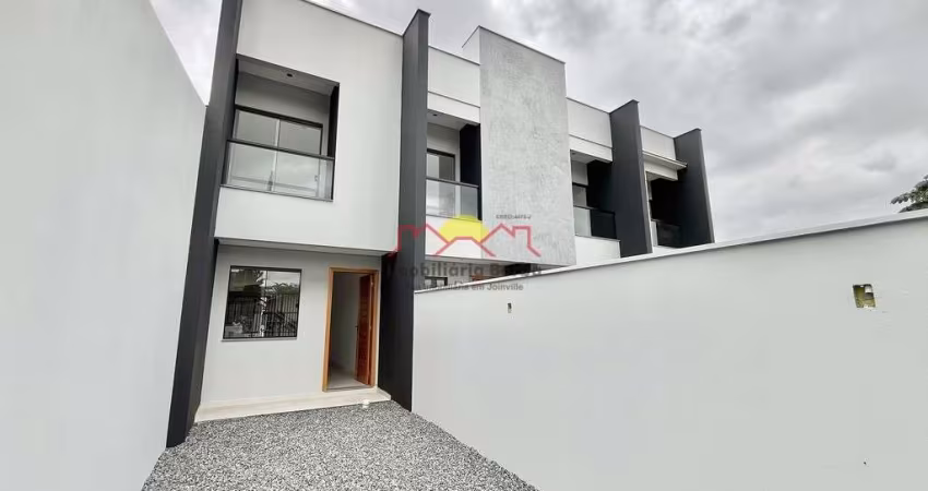 Sobrado Geminado com 02 Vagas de Garagem