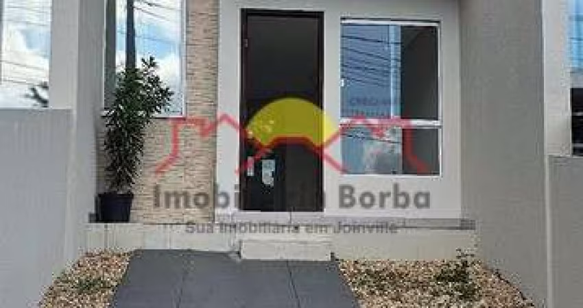 Sobrado Geminado com 02 Quartos e Churrasqueira