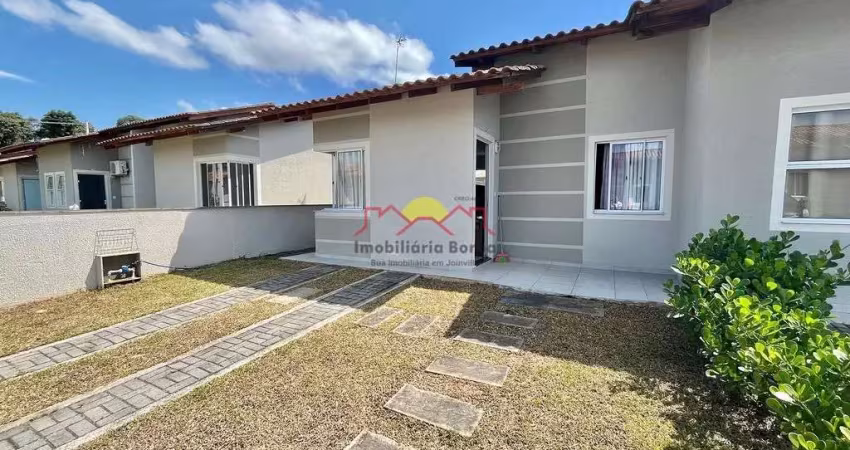 Casa Geminada com Passagem Lateral e 02 Quartos