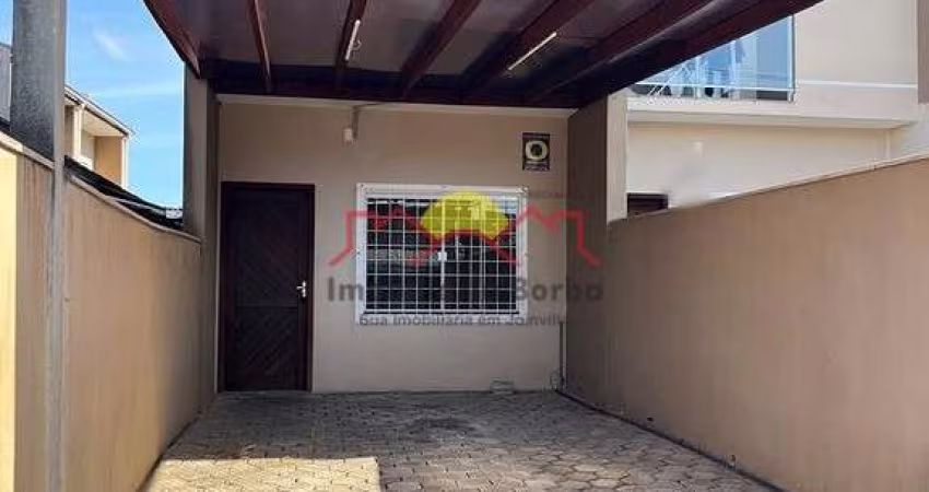 Sobrado Geminado com 02 Vagas de Garagem