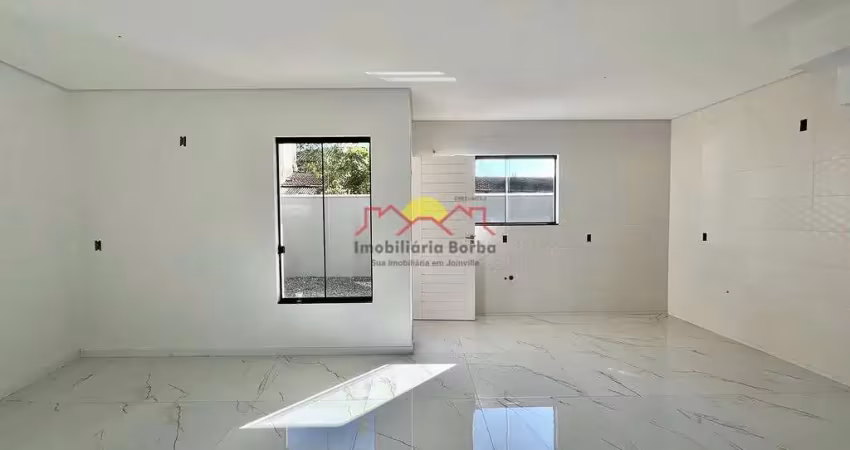 Sobrado Geminado com Suíte e 03 Vagas de Garagem