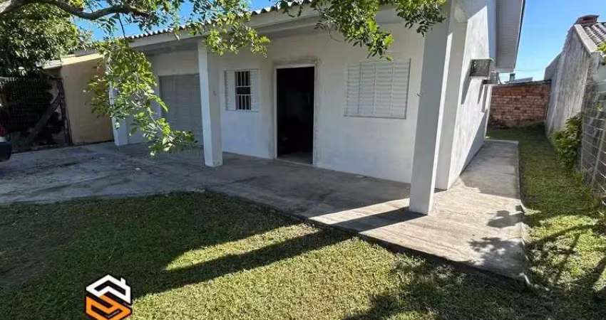 Casa na praia de imbé. balneário nordeste, em rua pavimentada!