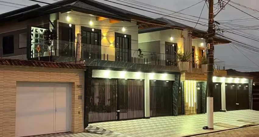 Casa com 2 dormitórios à venda, 54 m² por r$ 330.000 - maracanã - praia grande/sp