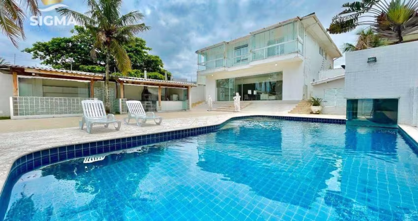 Casa com lazer de frente para o mar - Praia da Enseada, Guarujá.