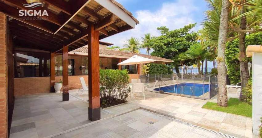 Casa na praia, Frente mar, 4 suítes, Piscina, 6 vagas, Enseada, Guarujá.