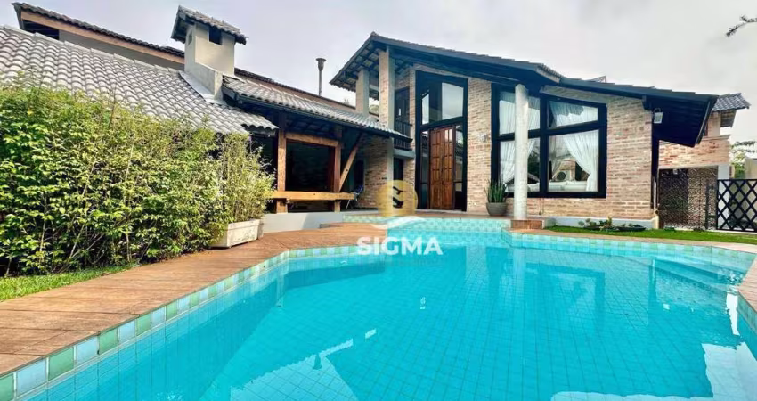 Casa com 4 Suítes à venda no Condomínio Jardim Acapulco - Guarujá/SP.