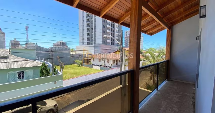 Sobrado com 4 dormitórios à venda, 300 m² por R$ 1.300.000 - Centro - Navegantes/SC