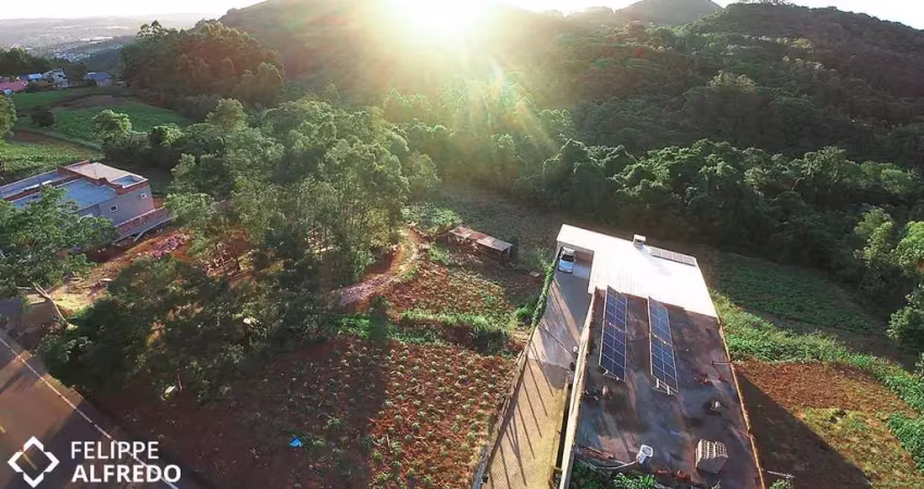 Terreno com vista do pôr-do-sol, 525m², à venda em morro reuter