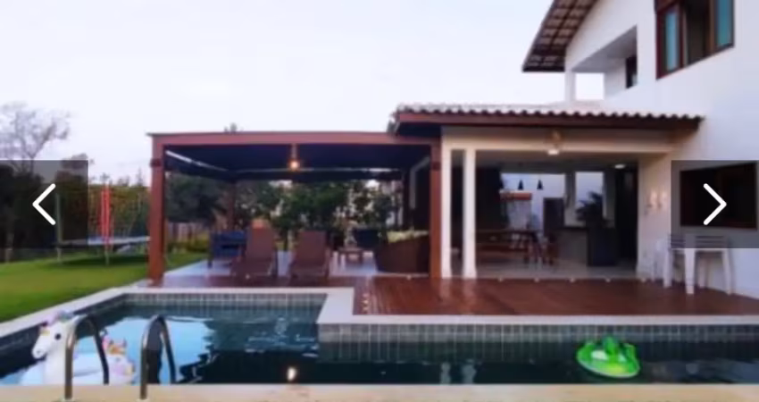 Vendo ou alugo casa de alto padrao , com 5/4, sendo 05 suítes, área privativa de 380 m2 no condomínio ilha dos pássaros - na praia do forte
