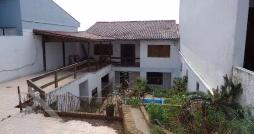 Casa em condomínio fechado com 3 quartos à venda na Rua Peri Melo, 245, Nonoai, Porto Alegre