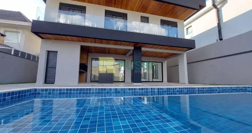 Sobrado com 4 dormitórios à venda, 450 m² por r$ 2.900.000,00 - condomínio residencial jaguary - sã